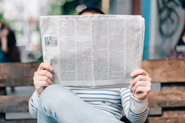 Man reading newspaper